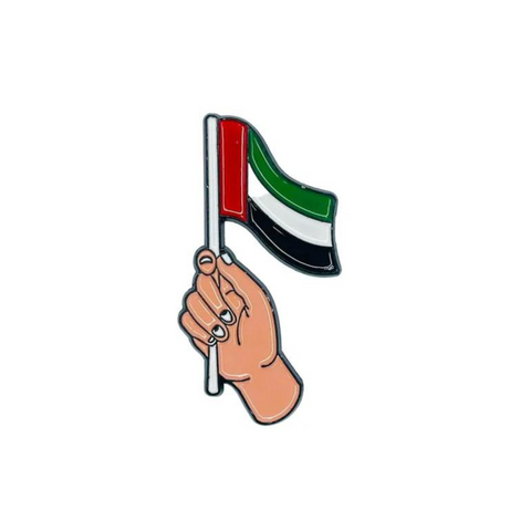 بروش ستكر - يد تمسك علم الامارات