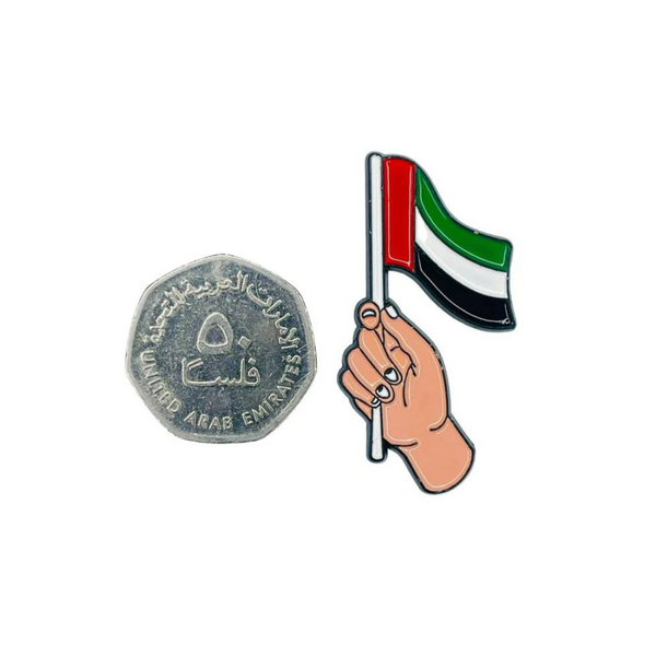 بروش ستكر - يد تمسك علم الامارات
